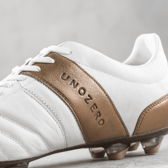 Unozero Modelo 1.0 Firm Ground Soccer Cleats White Gold
